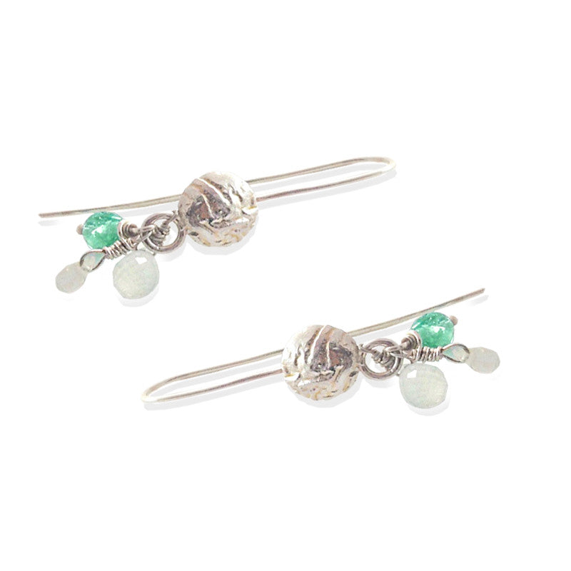 Earrings with both a smooth and grainy feel.  Colors are silver and turquoise blue.  